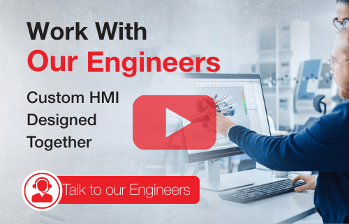 Engineer collaborating on interface design using NKK SmartDisplay switches, reviewing schematics and hardware integration in a well-lit workspace.