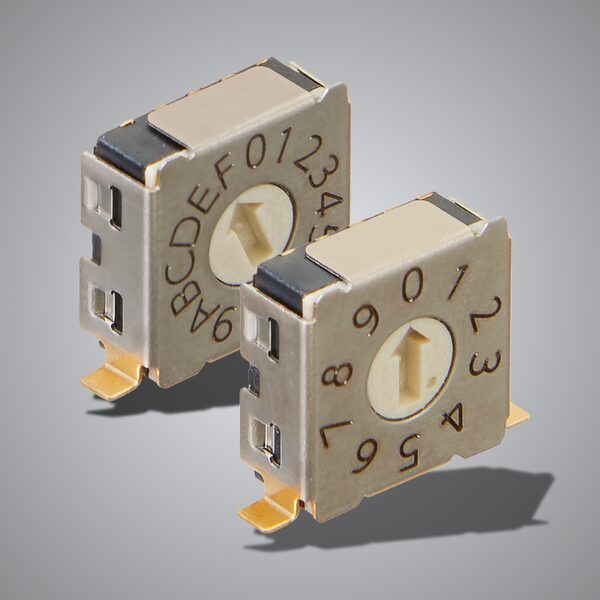 Technical drawing of an NKK FD02 right-angle mount DIP rotary switch. The diagram shows the switch in profile with pins extending horizontally for PCB mounting, alongside labeled dimensions of height, width, and depth.